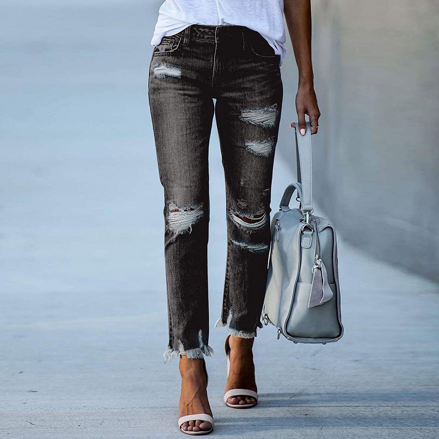 Young women's tight-fitting solid white jeans with ripped jeans